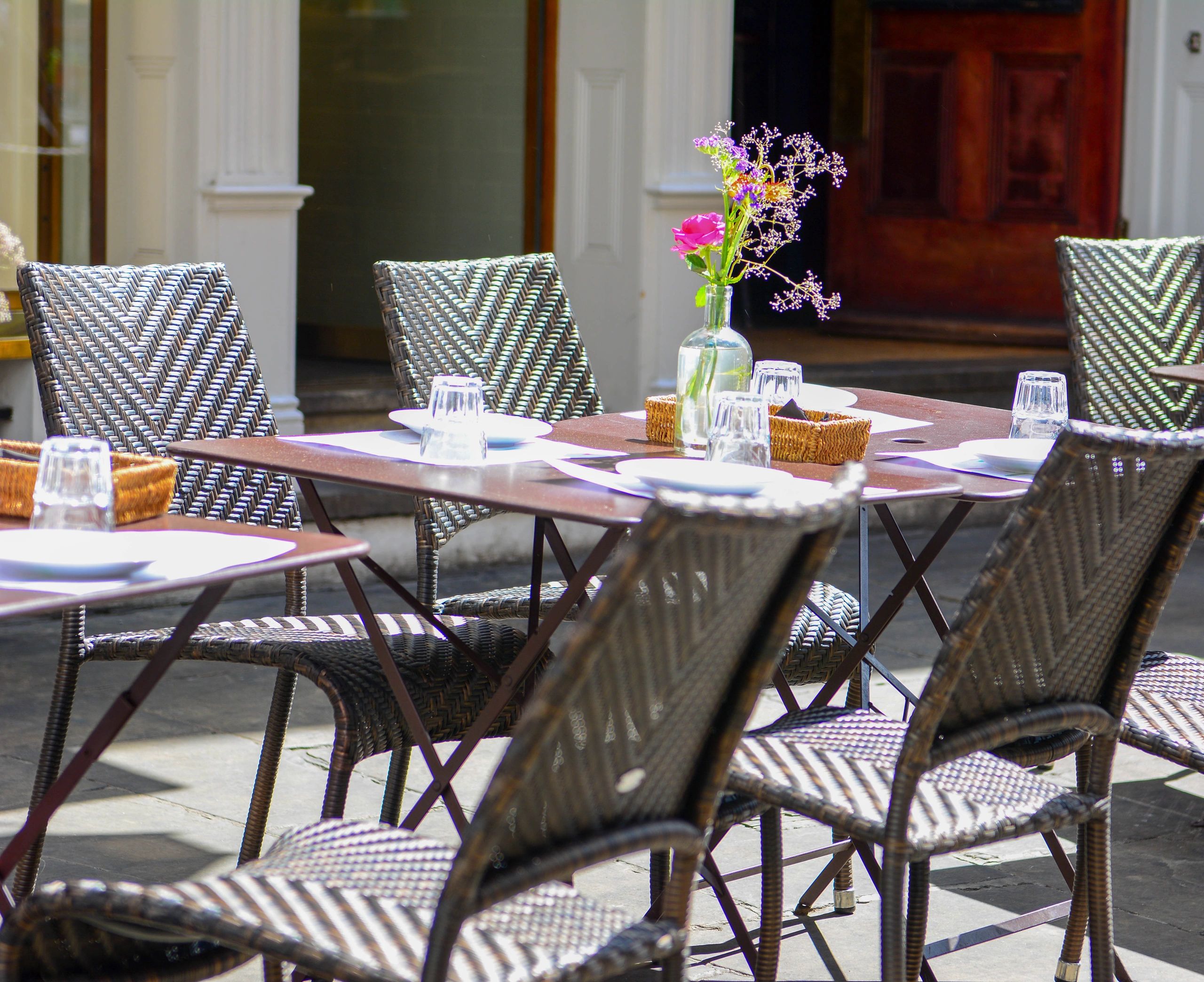 Outdoor restaurant seating set for guests
