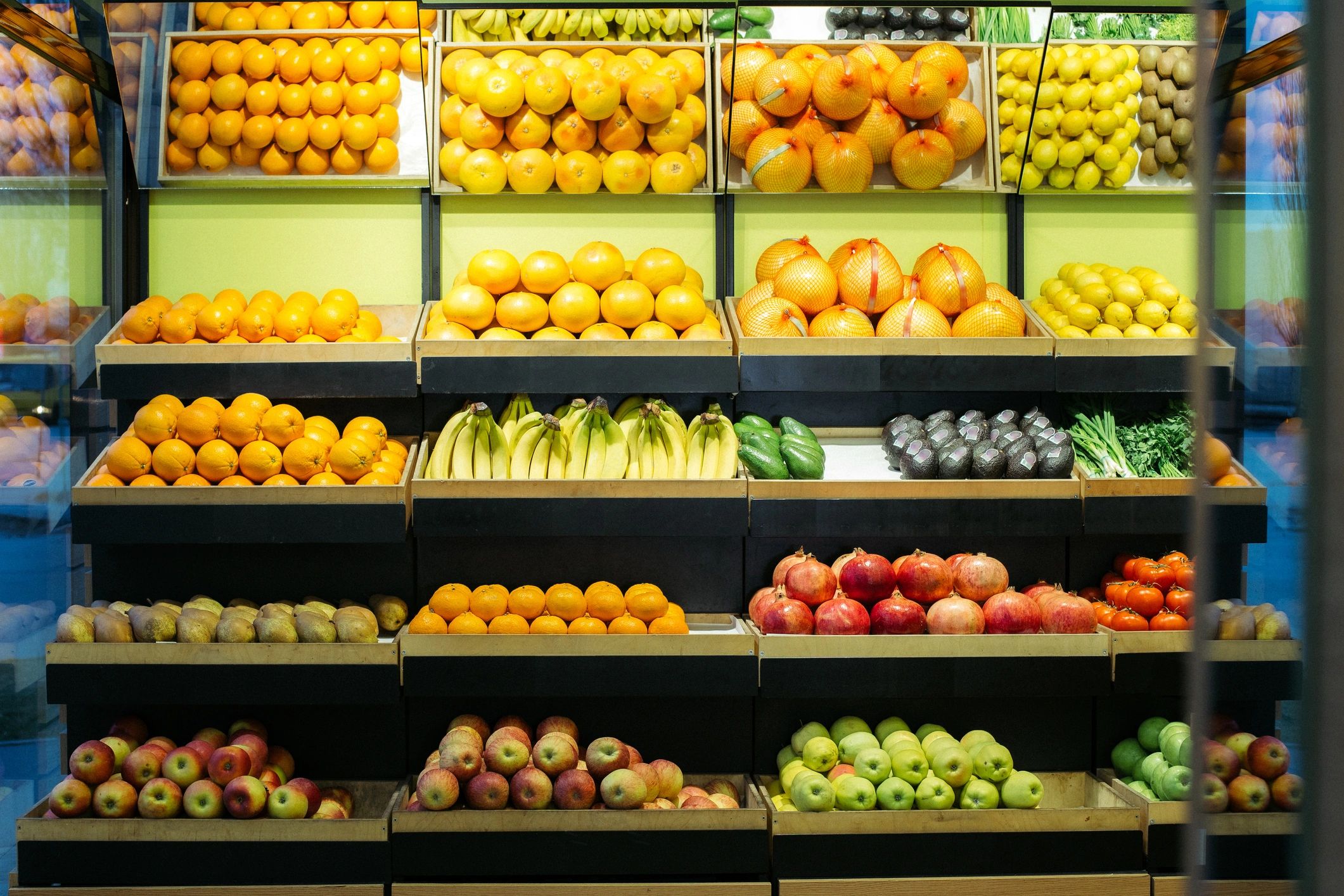 Colorful fruit display on grocery shelves