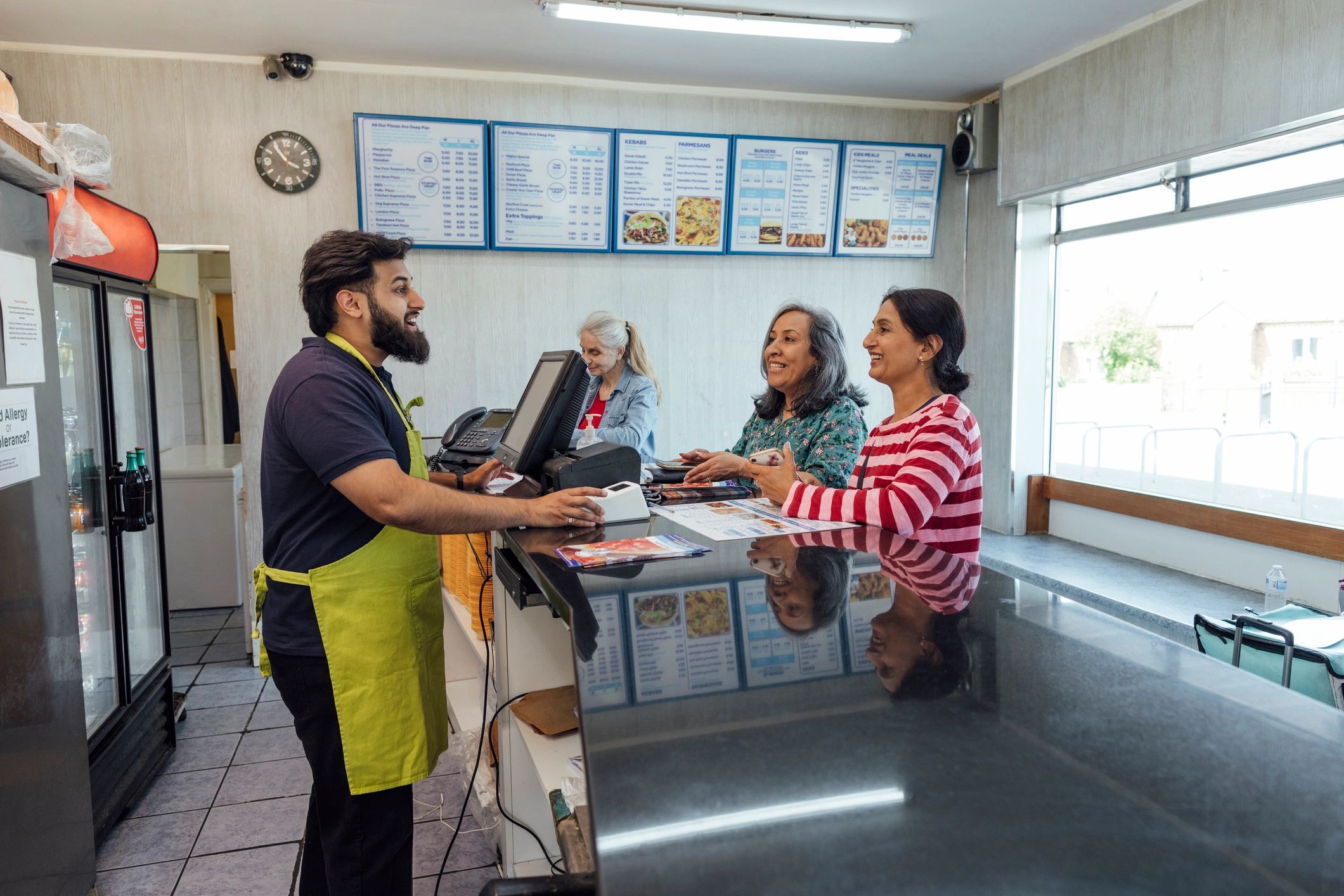 Customers shopping in a busy retail setting