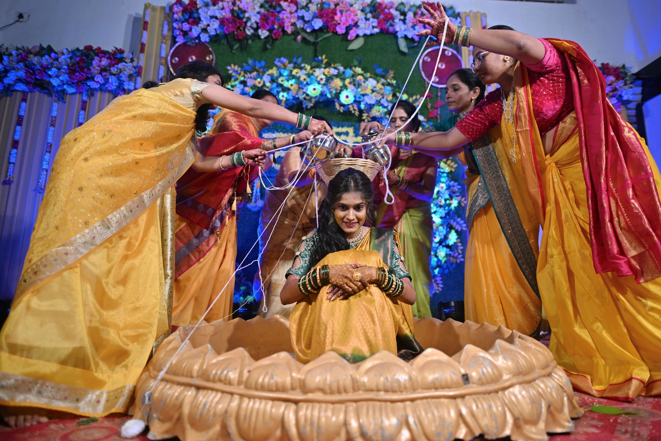 Bride in a traditional ceremony with family